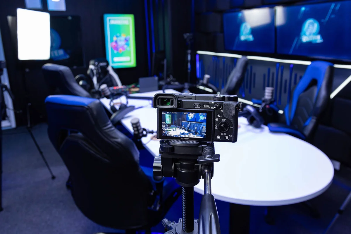 Camera filming a video podcast in a studio
